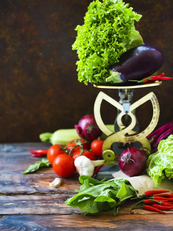Autumn vegetables on wooden background. Organic food and healthy eating concept
