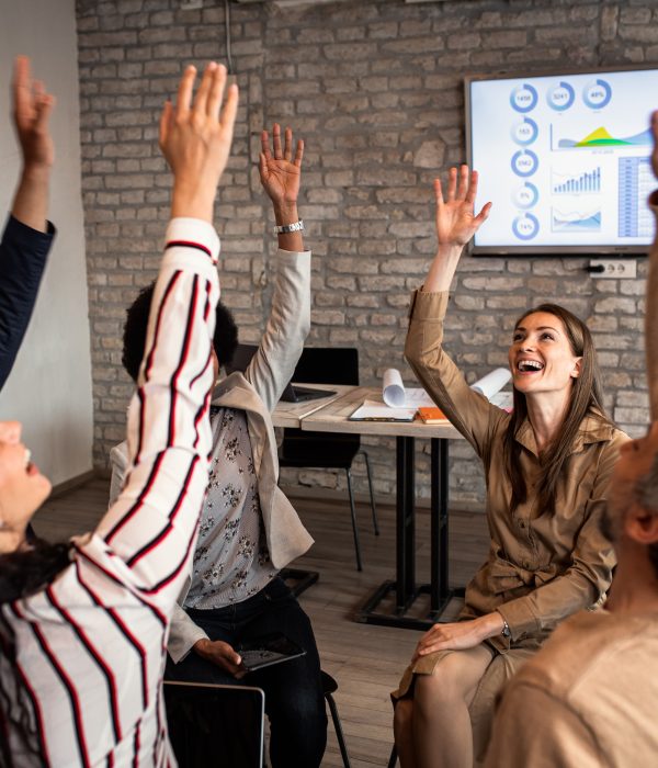 Group of diverse group of business people having a meeting while sitting in circle.